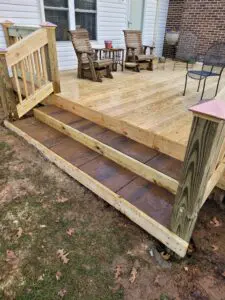 Stone stair case built onto to wooden deck in murfreesboro