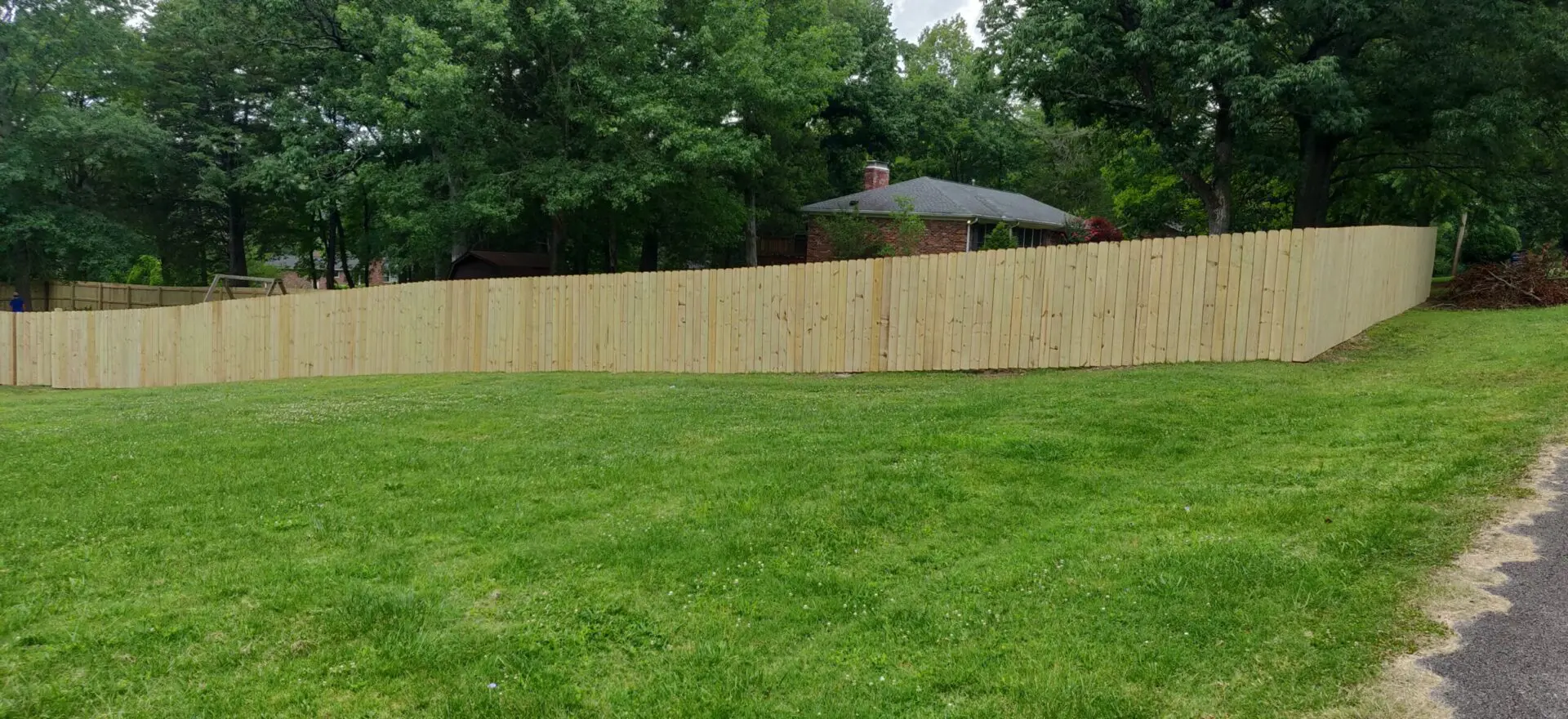 Large wooden fence built  & design by the Asset Solution Company. Top fence company in Murfreesboro, TN
